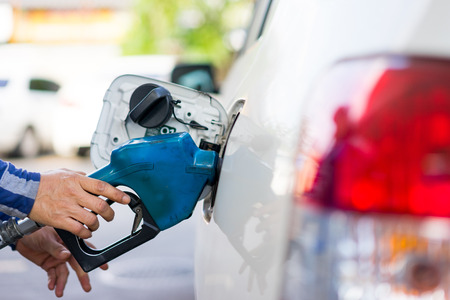 Refill fuel to a car at gas station