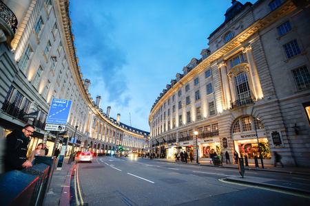 LONDON - FEB 24: One of the most famous tourist destination, Piccadilly Circus, in London. The big advertising screen have become a major attraction of London.のeditorial素材