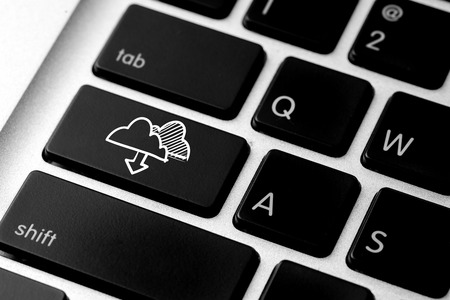 Cloud online data icon on computer keyboard