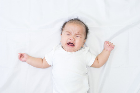 Newborn Asian baby cryingの写真素材