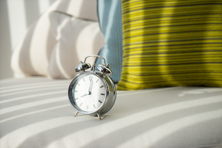 Alarm clock at 8 am. to wake upの写真素材