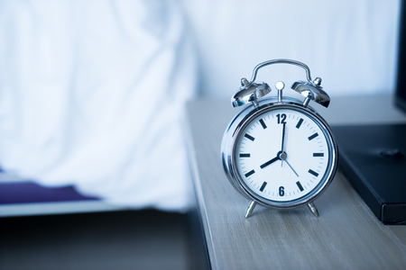 Alarm clock at 8 am. to wake upの写真素材