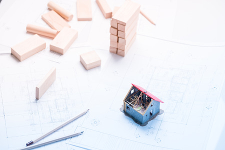 Home concept with blueprint in studio