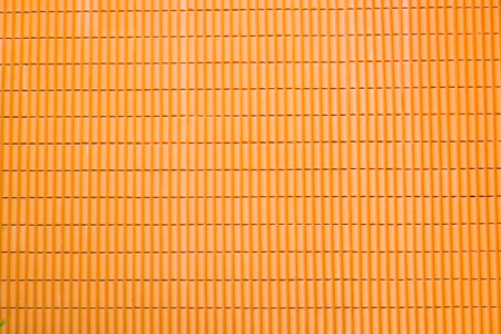 Orange & red brick background for buildingの写真素材