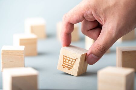 Business, marketing & online shopping strategy concept icon on the cube & computer keyboard