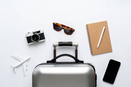 Travel concept from the top view with luggage and airplaneの写真素材