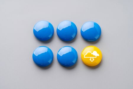Cloud icon on colorful cube with hand