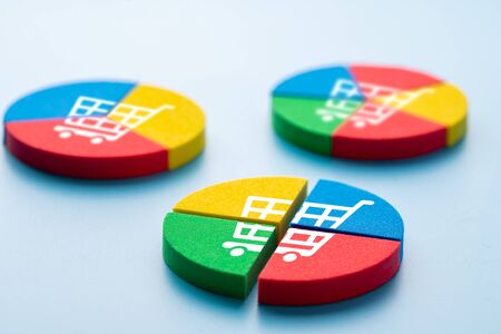 Online shopping icon on colorful jigsaw puzzle for global concept