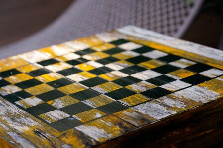 Vintage wood chess board backgroundの写真素材