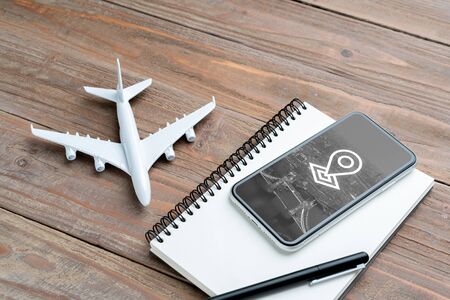 Online Travel & airplane icon application on smart phoneの写真素材