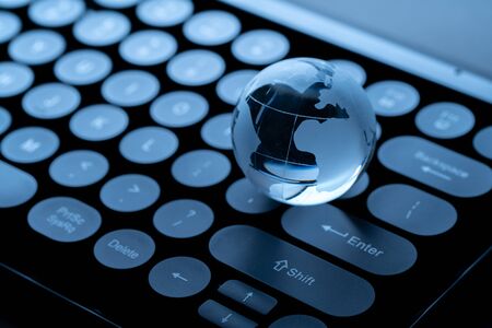 Online shopping icon with globe for global concept 