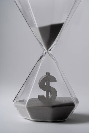 Sand clock for business concept and currency exchangeの写真素材