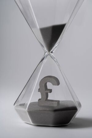 Sand clock for business concept and currency exchangeの写真素材