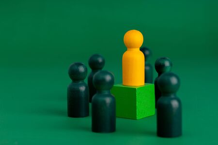 Business & HR global wood puzzle concept for leadership and team with peg dollの写真素材