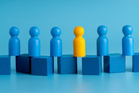 Business & HR global wood puzzle concept for leadership and team with peg dollの写真素材