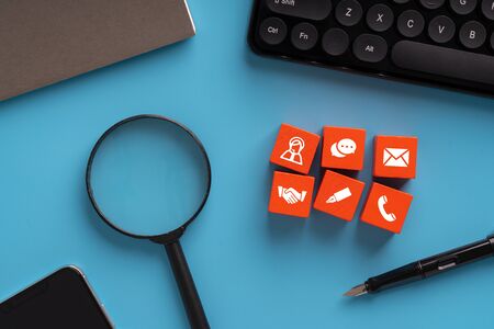 Contact us icon on colorful puzzle
