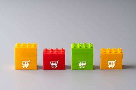 Online shopping icon on colorful puzzle cube