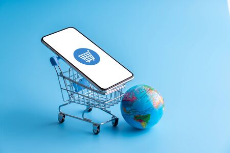 Online shopping & cloud icon on mobile phone applicationの写真素材