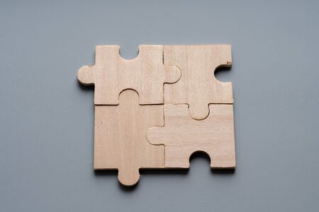 Wood puzzle for business conceptの写真素材