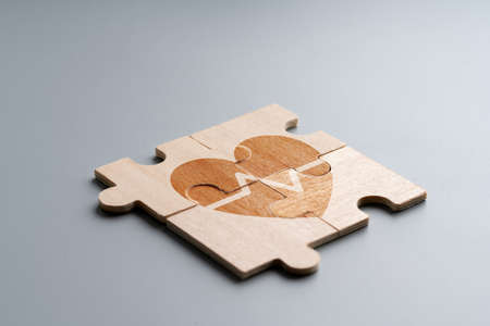 Medical icon on jigsaw puzzle for global health careの写真素材