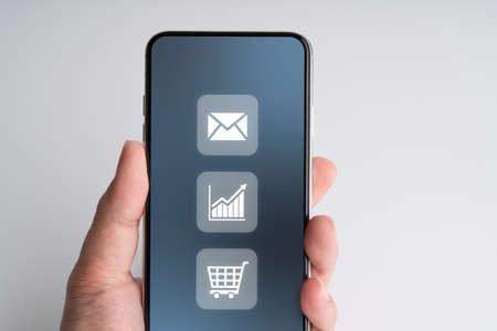Online shopping icon on smart phoneの写真素材