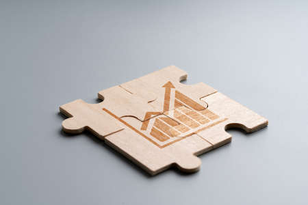 Online shopping icon on wood puzzleの写真素材