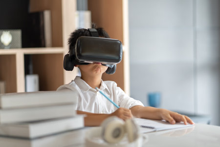 Asian boy study online with VR, virtual realityの写真素材