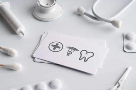 Plain name card with Medical icon on white monotone backgroundの写真素材