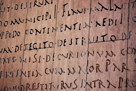 Letters engraved in woodの写真素材