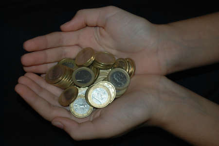 Coins in hands