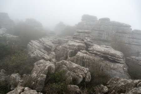 Landscape view of rocks in the fog at Torcal Antequera, Spainの写真素材