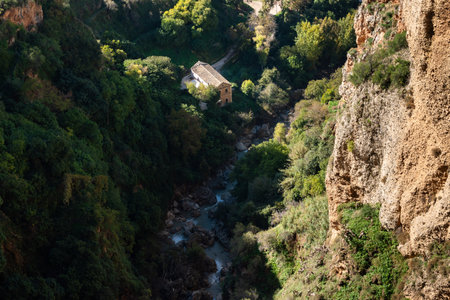 Rural landscape with a small village in the middle of a gorgeの写真素材