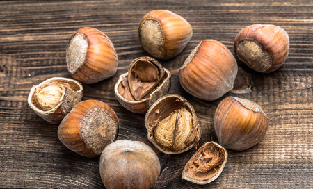 Hazelnuts on a wooden background.の写真素材