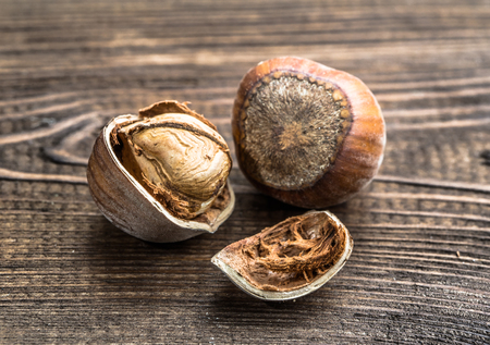 Hazelnuts on a wooden background.の写真素材