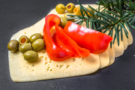 Ingredients of breakfast with cheese slices and vegetables.の写真素材
