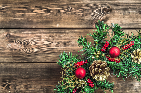 Ornamental christmas frame on wooden tableの写真素材
