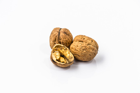 Walnuts isolated on a white background.