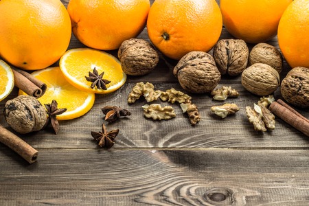 Christmas setting with seasonal spices and fruits.の写真素材