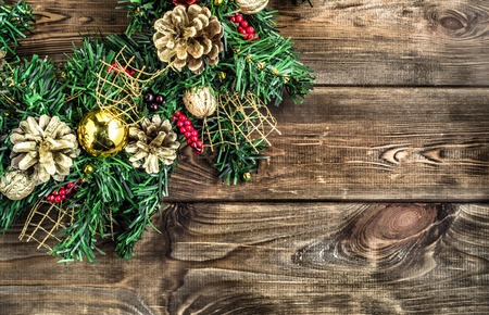 Ornamental christmas frame on wooden tableの写真素材