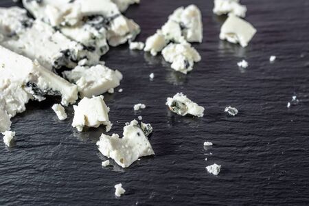 Blue cheese, french appetizer on black slateの写真素材
