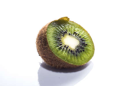 Half of kiwi isolated on a white backgroundの写真素材