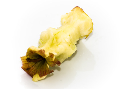 Apple core on a white backgroundの写真素材