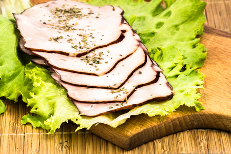 Healthy breakfast with vegetables and sausage on kitchen table, from aboveの写真素材