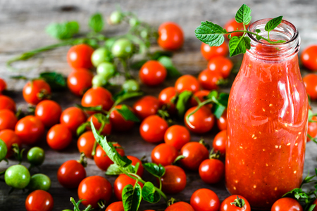 Tomato juice and fresh tomatoes, healthy eating, organic food and weight loss conceptの写真素材