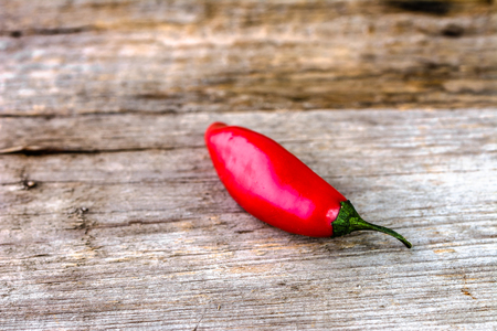 Red hot chili pepper or spicy chilli cayenne pepper, spice from mexican cuisineの写真素材