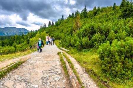 ZAKOPANE, POLAND - AUGUST 16, 2016: People hiking in mountains, travel lifestyle and active vacation in outdoorsのeditorial素材