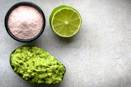 Mexican sauce, guacamole with avocado, vegetarian diet and healthy food conceptの写真素材
