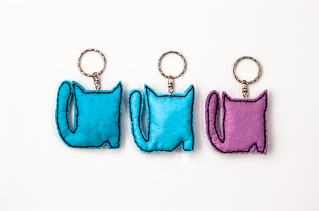 Cats key rings isolated on white background