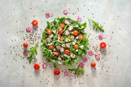 Fresh vegetable salad, healthy food on plate, overheadの写真素材