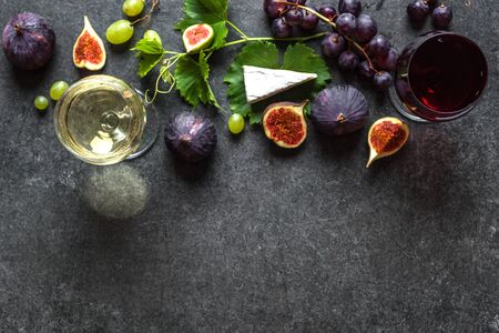Wine snack set, fruit and cheese, wine appetizer, food backgroundの写真素材